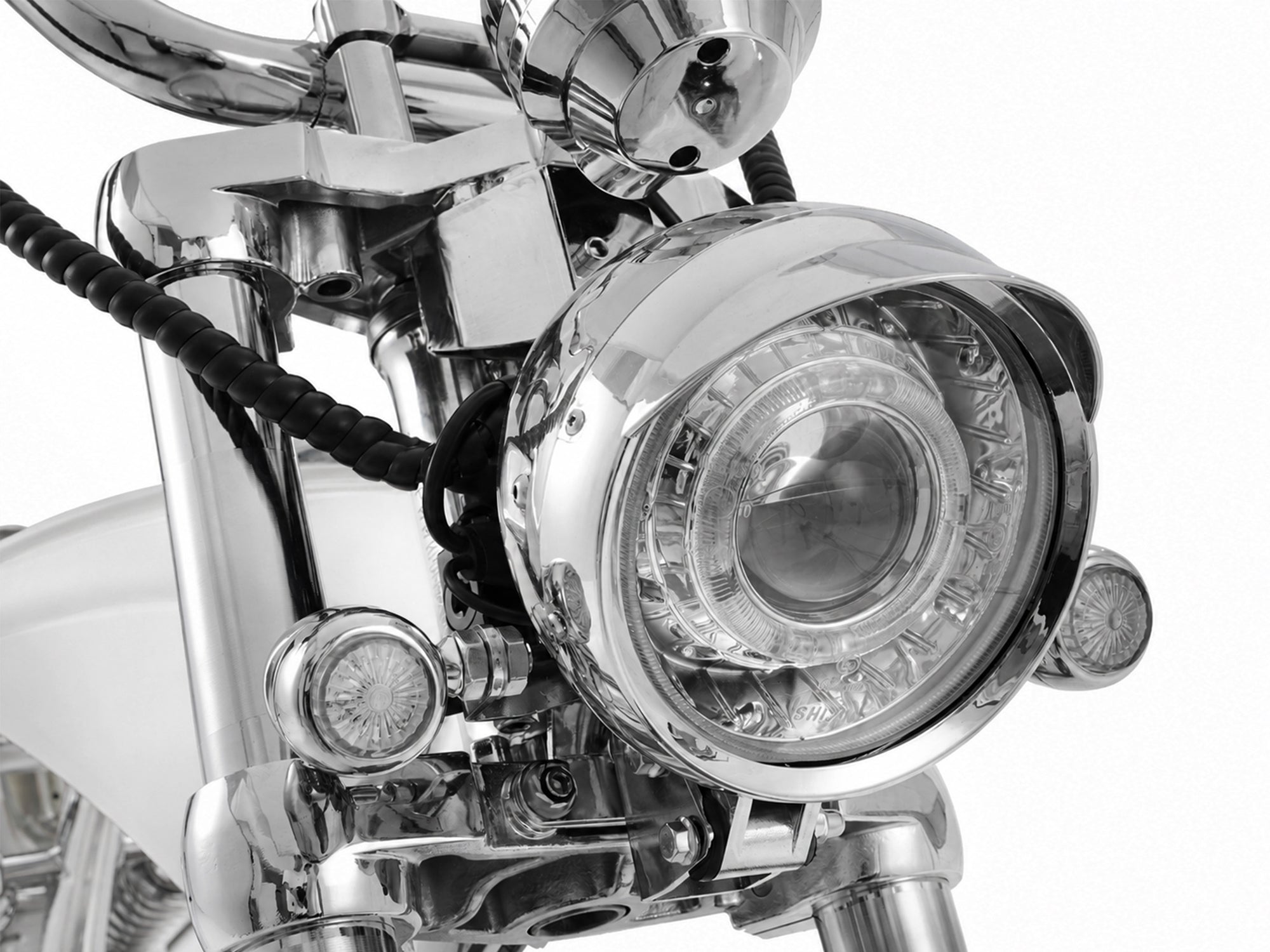 High-angle close-up of the front headlight assembly on an Eahora chopper electric motorcycle