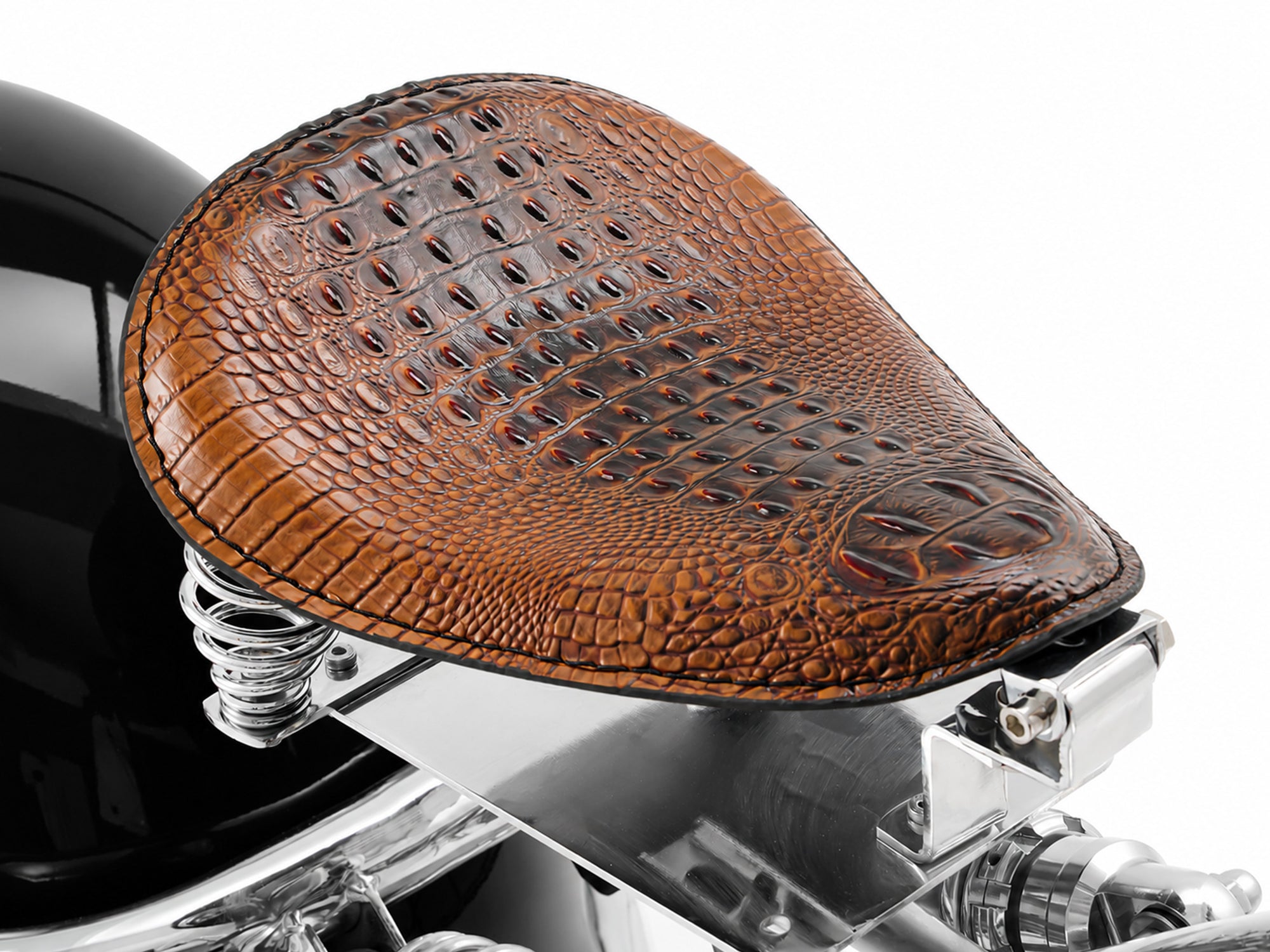 Up-close shot of the crocodile-pattern leather seat designed for a chopper electric motorcycle