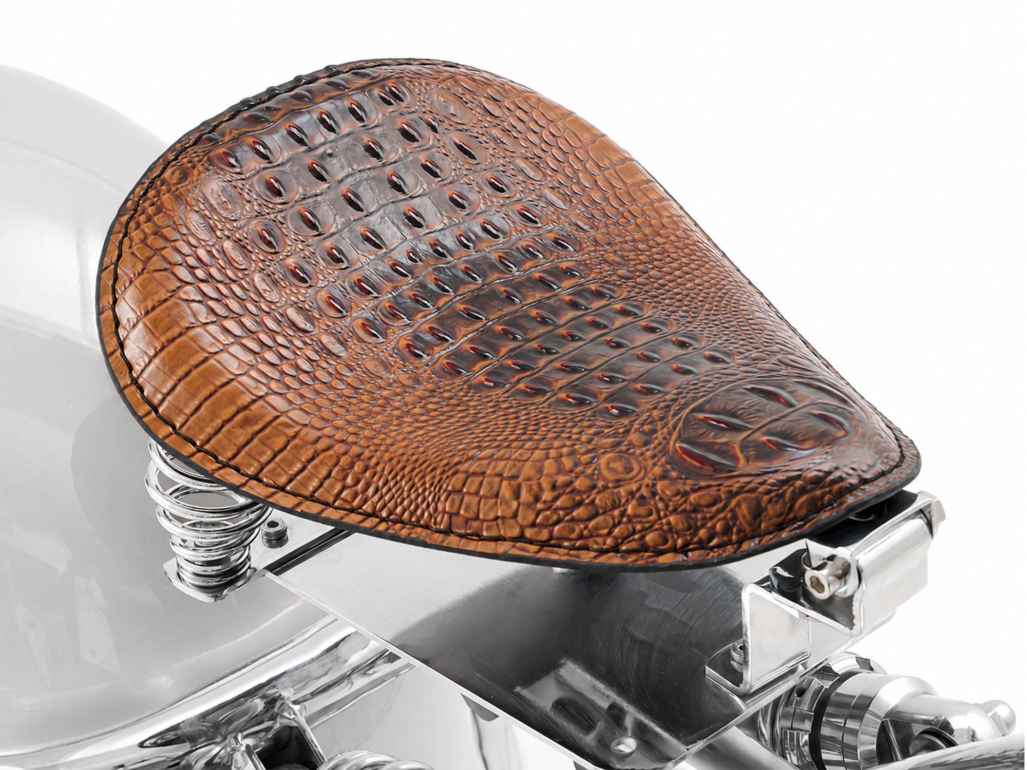High-detail close-up of the textured brown leather seat on an Eahora chopper electric motorcycle