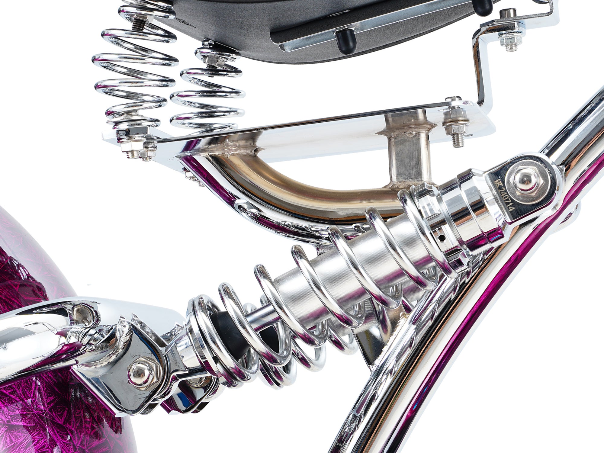 Polished chrome coil spring shock absorber detail for a chopper electric motorcycle