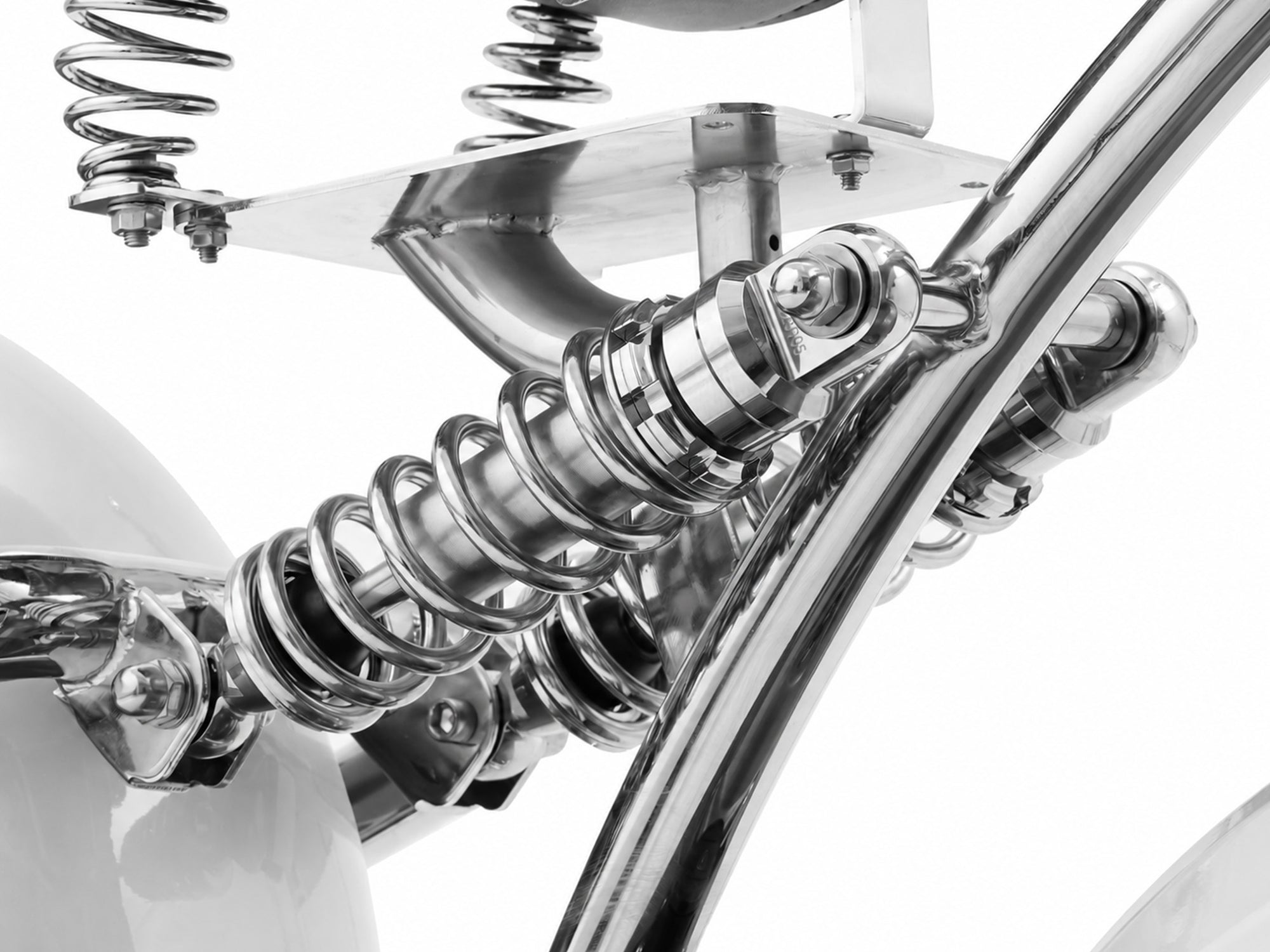 Up-close view of the chrome-plated shock setup on an Eahora chopper electric motorcycle