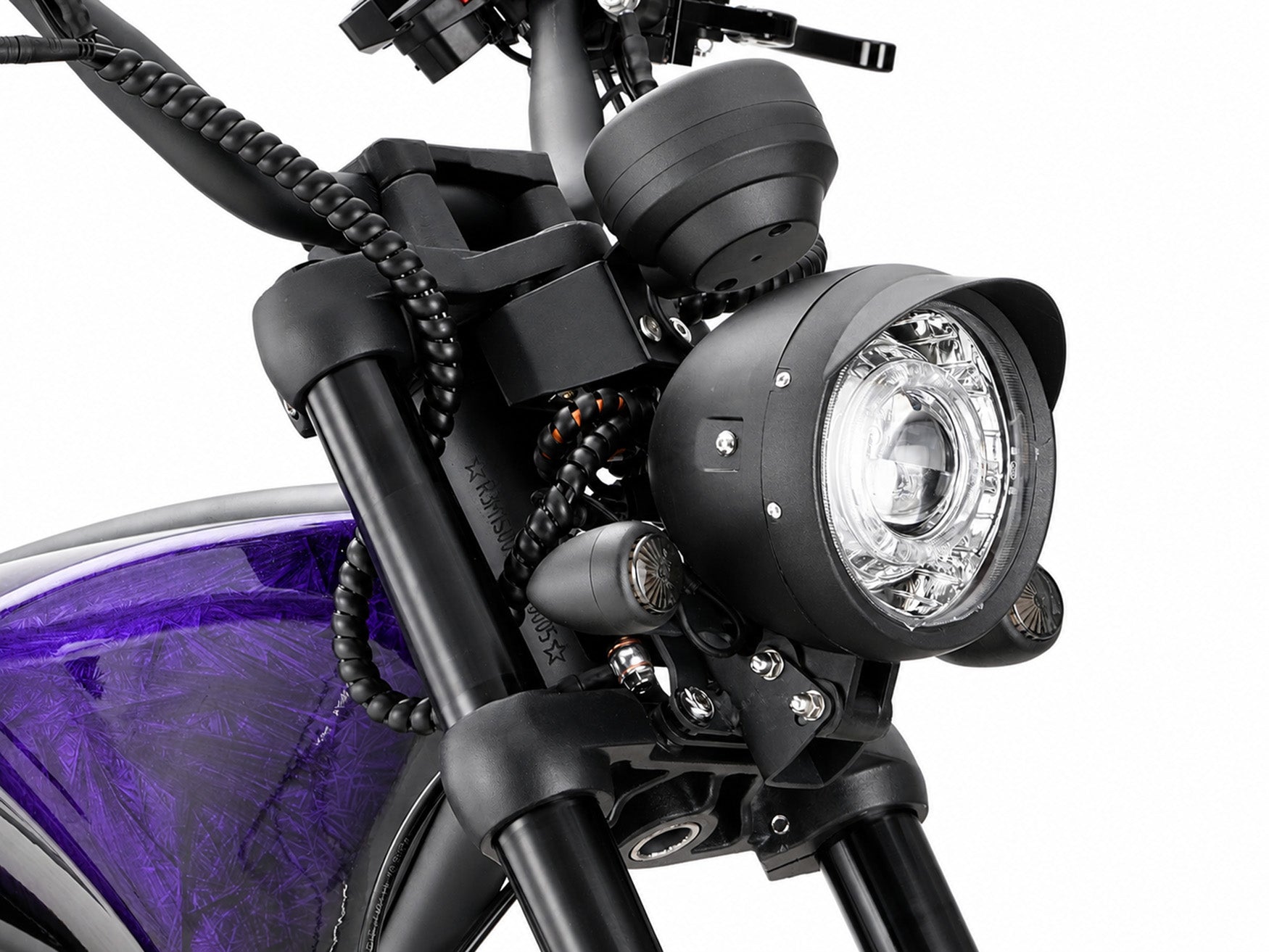 Close-up of the matte black LED headlight assembly on the Midnight Purple Eahora M1PS chopper