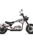 A chopper-style electric scooter with a black frame and seat, decorated with a white and red graphic pattern, shown against a plain white background.